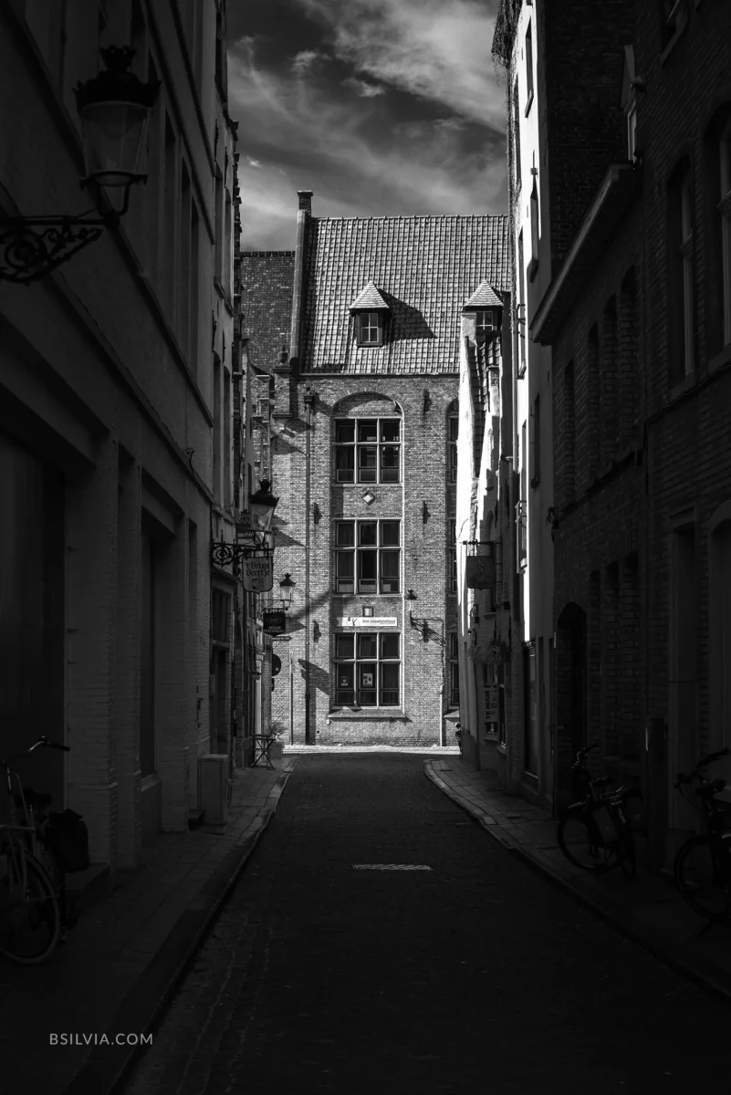 infrared street Bruges narrow alley architecture black and white